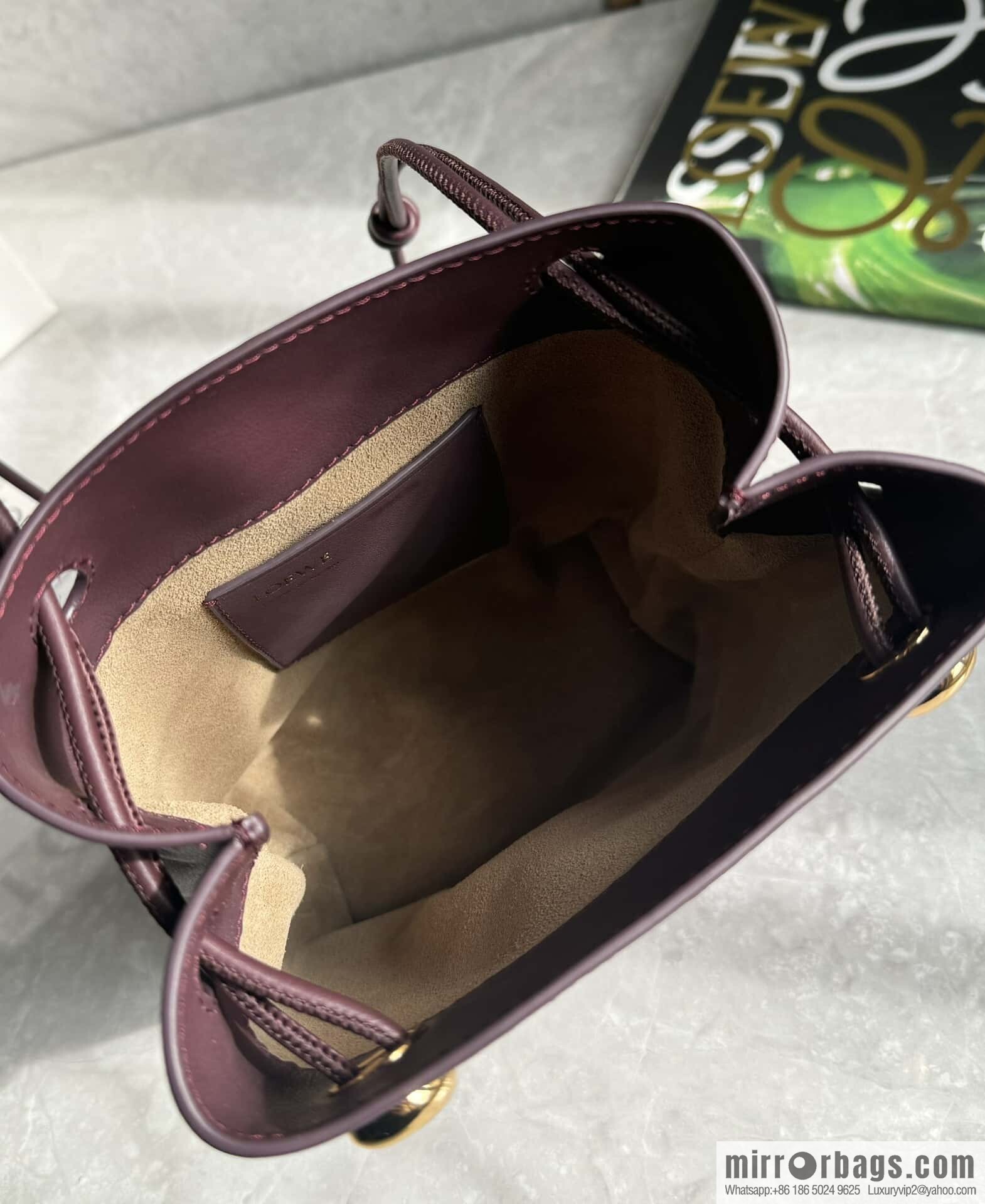 LOEWE's new Pebble Pouch 0905 burgundy