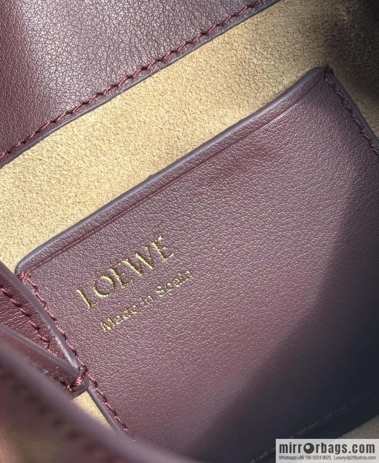 LOEWE's new Pebble Pouch 0905 burgundy