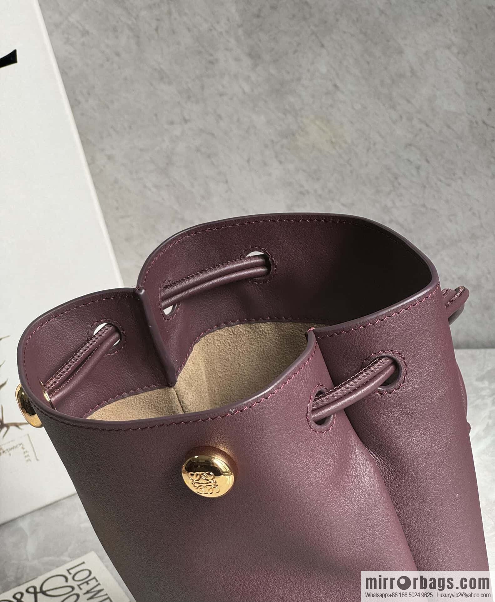LOEWE's new Pebble Pouch 0905 burgundy