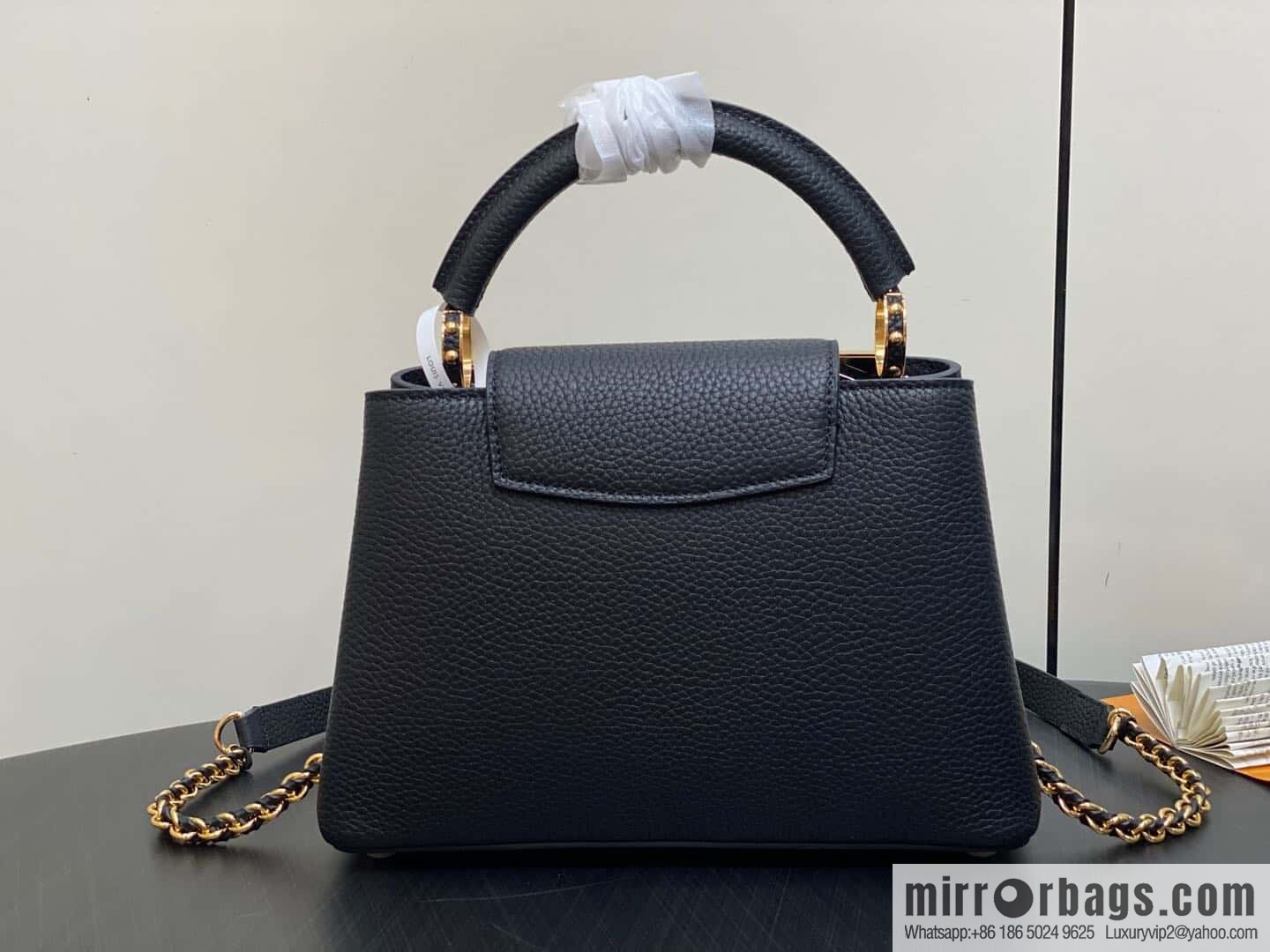 [Boutique‑grade] M12751 black full leather rhombus, full leather cap that English series, this Capucines small handbag