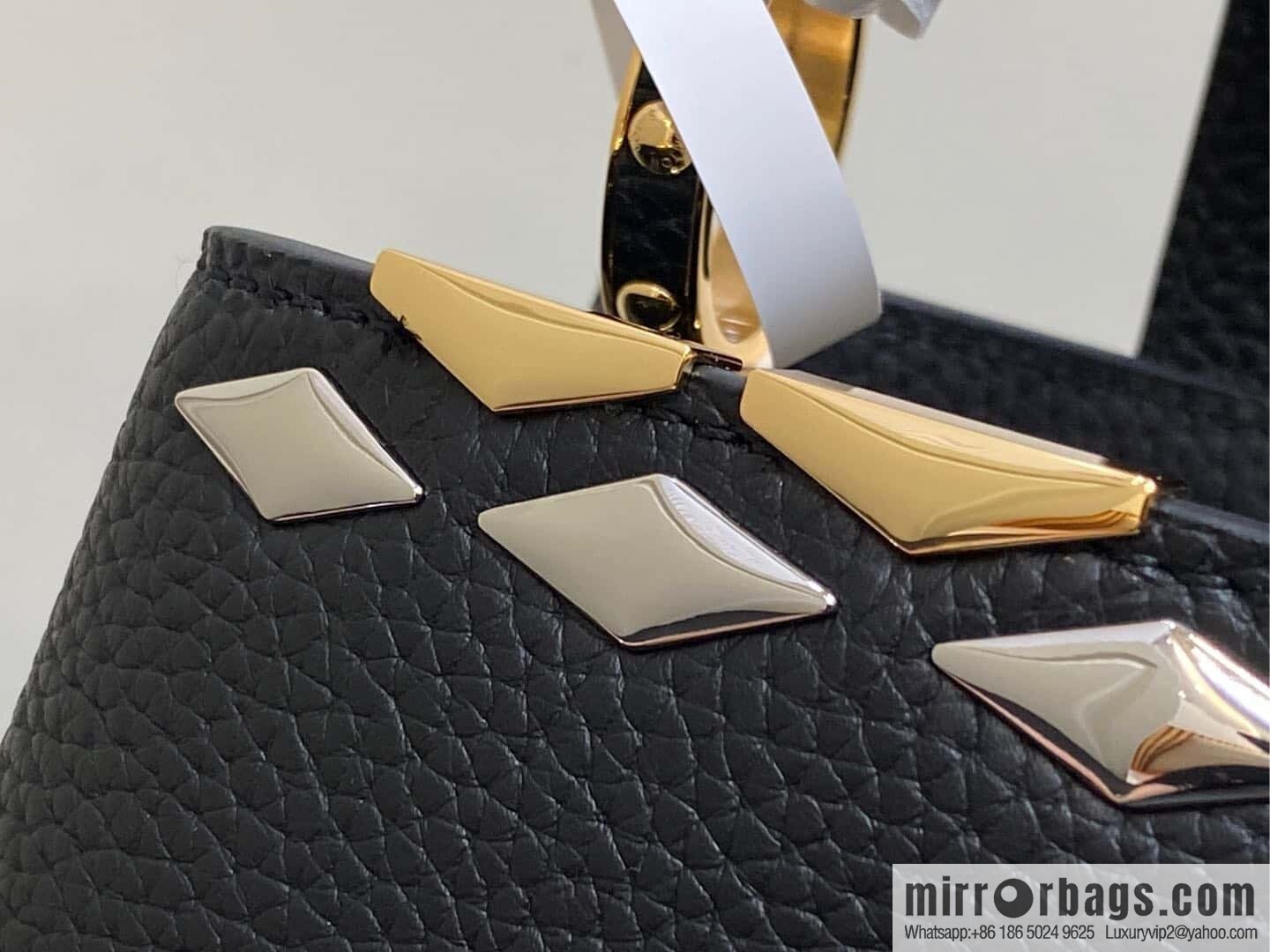 [Boutique‑grade] M12751 black full leather rhombus, full leather cap that English series, this Capucines small handbag