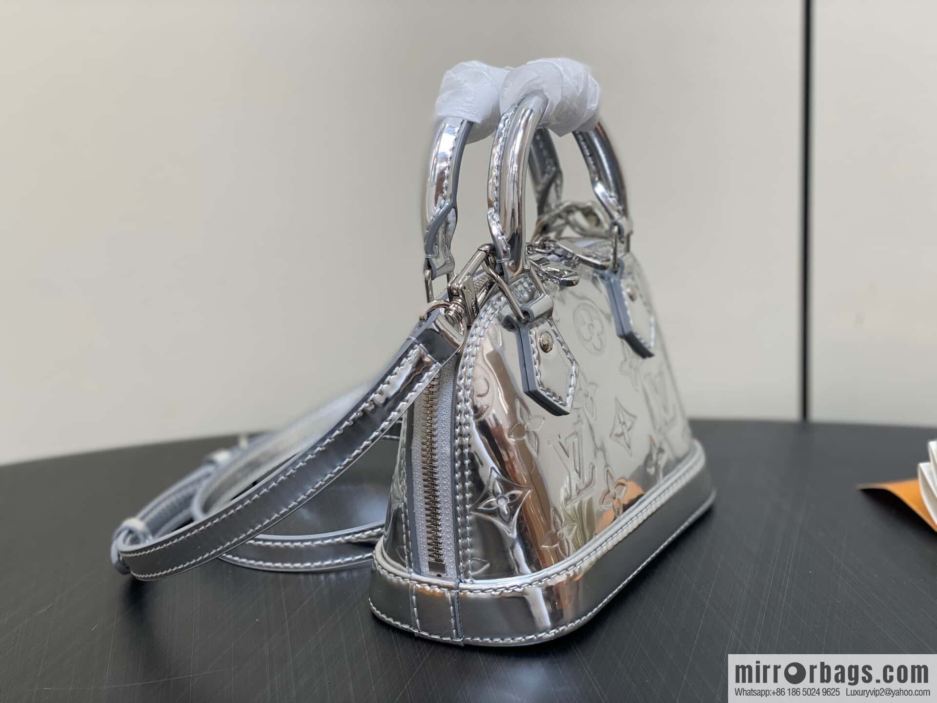 [Boutique‑grade] M81945 silver patent leather, water ripple shell bag series NANO ALMA handbag M82682 M82411