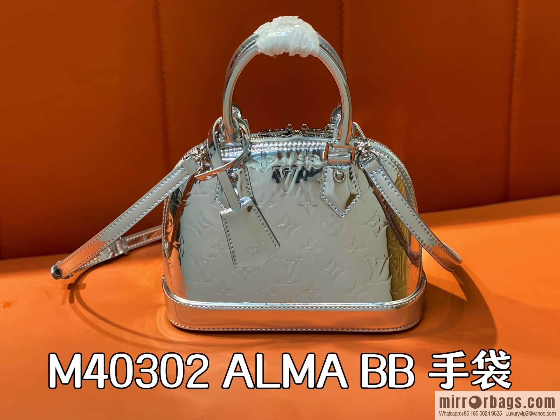[Boutique‑grade] M40302 silver patent leather M40302 water ripple shell bag series ALMA BB handbag