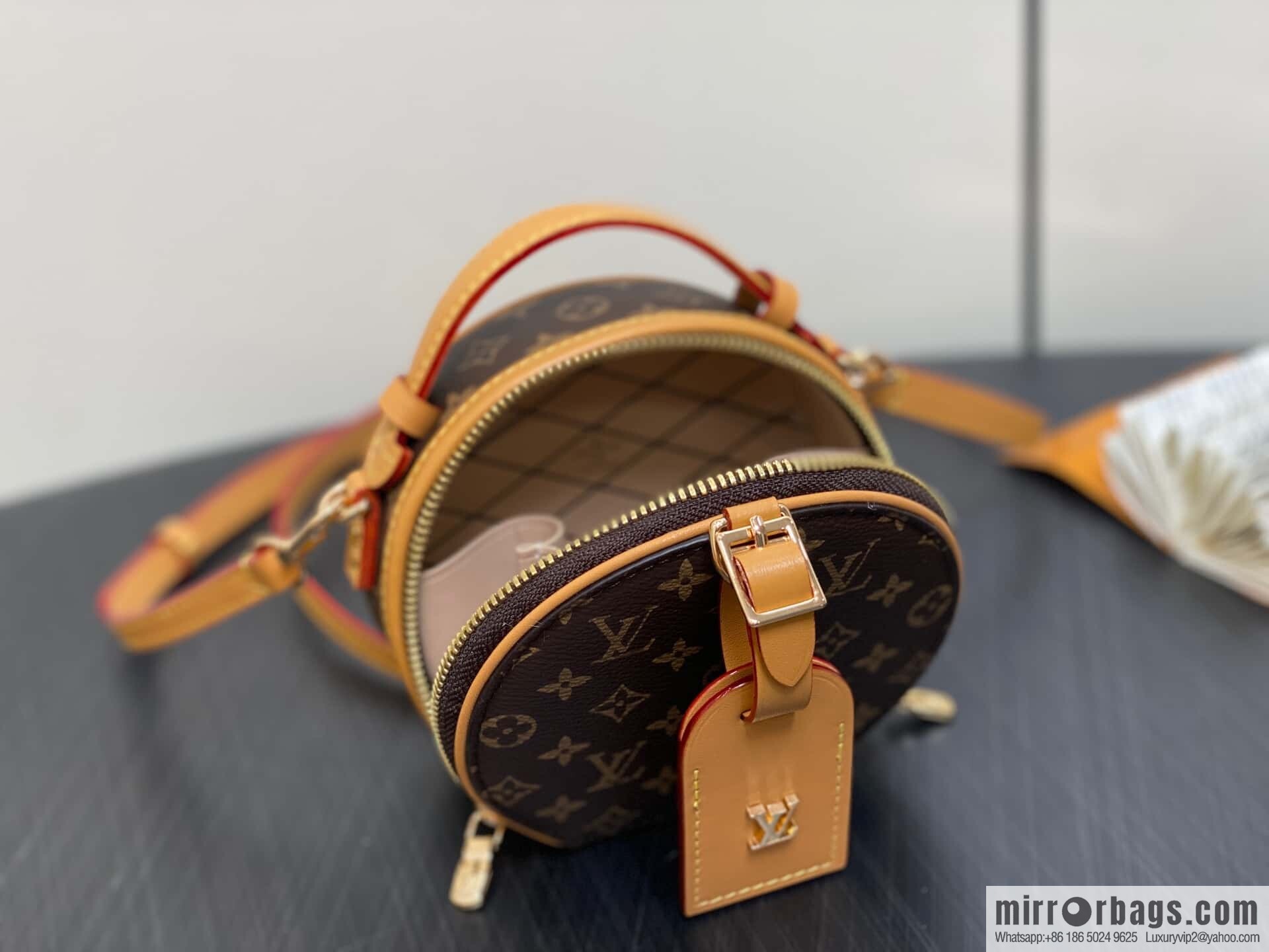 [Boutique‑grade] M83575 presbyopia M83614 yellow flower, small apple bag MINI round cake bag Mini Boite Chapeau handbag