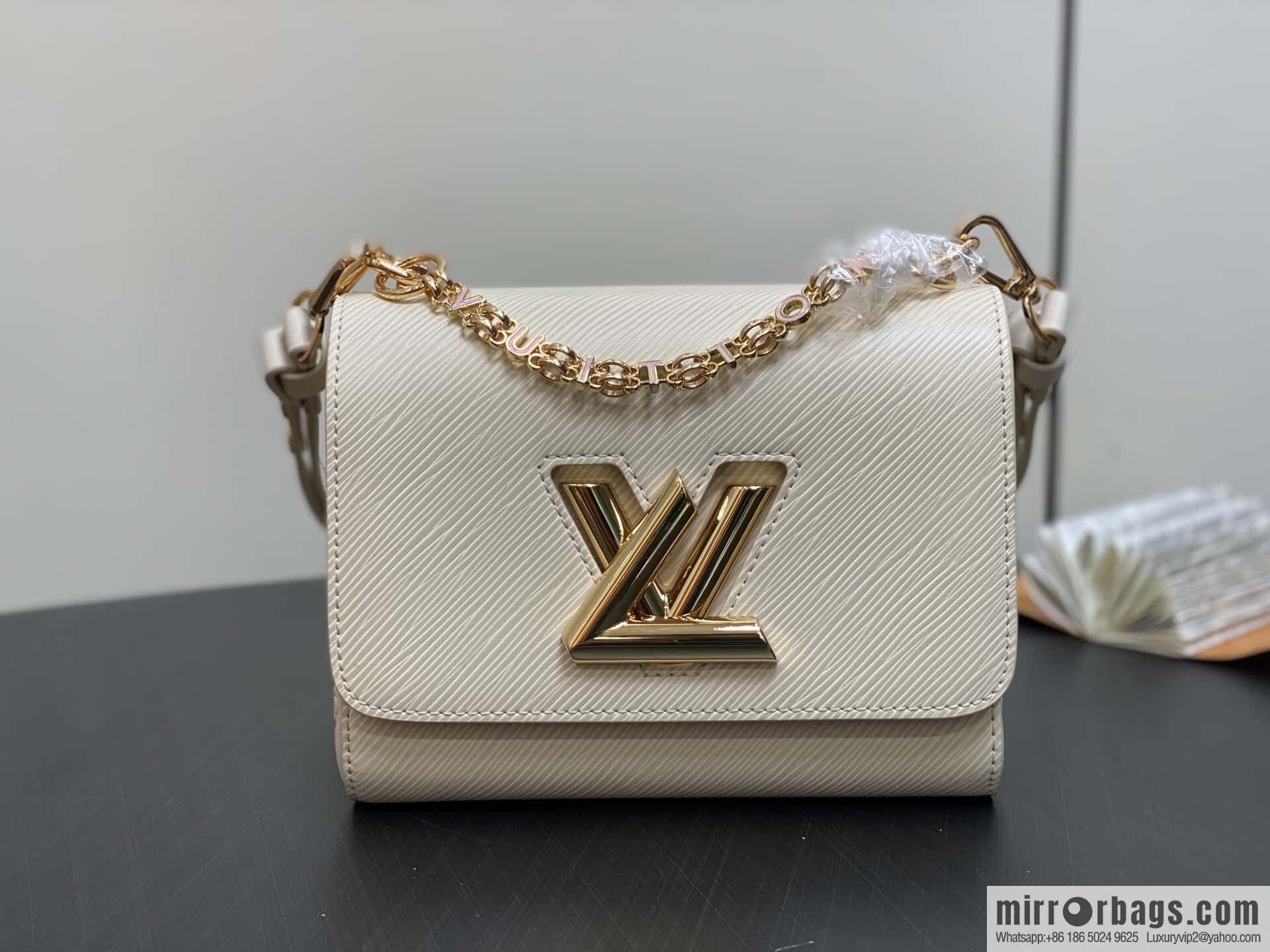 [Boutique‑grade] M50332 meters white letters, water ripple Twist chain bag Twist PM handbag