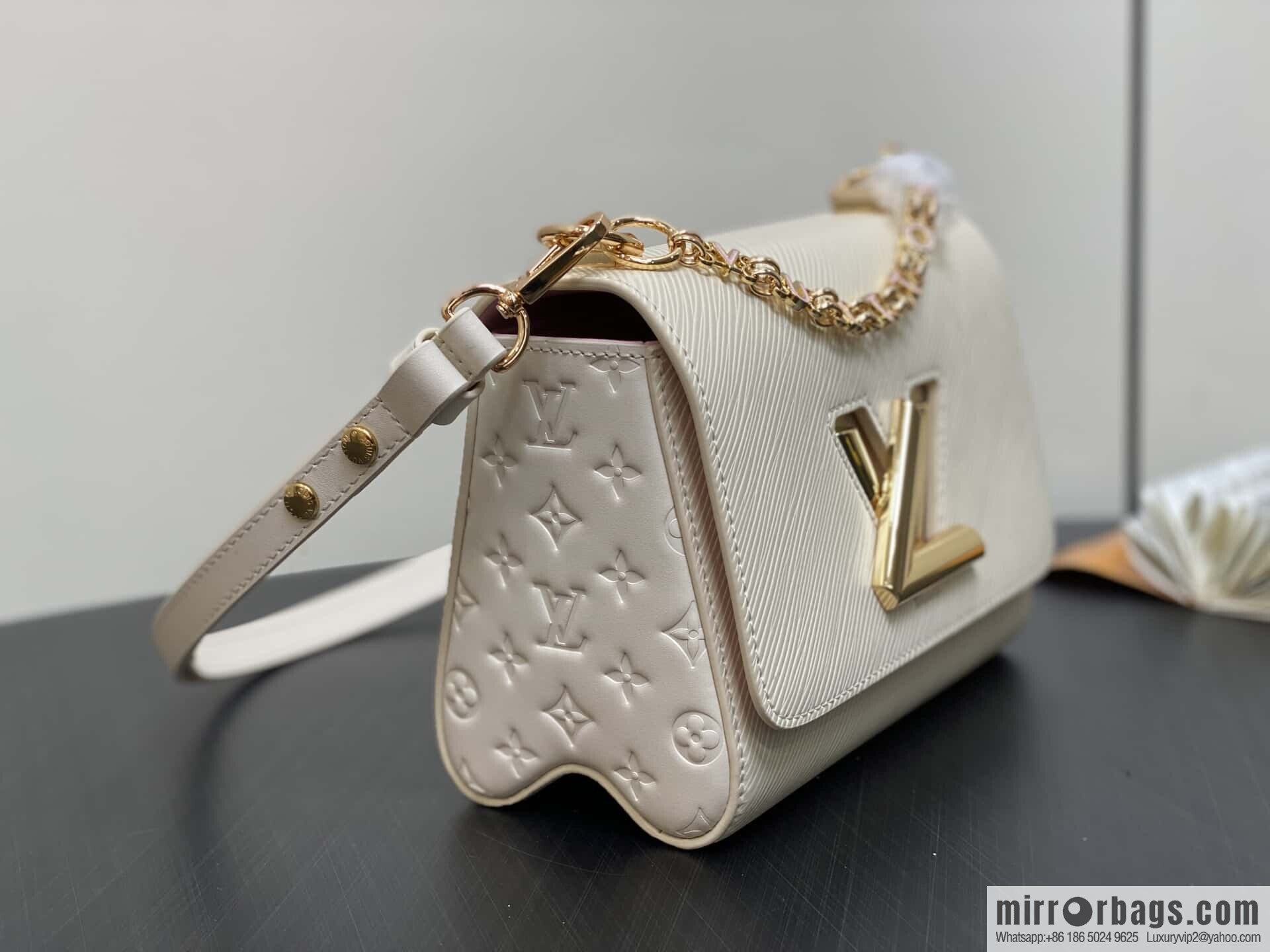 [Boutique‑grade] M50332 meters white letters, water ripple Twist chain bag Twist PM handbag