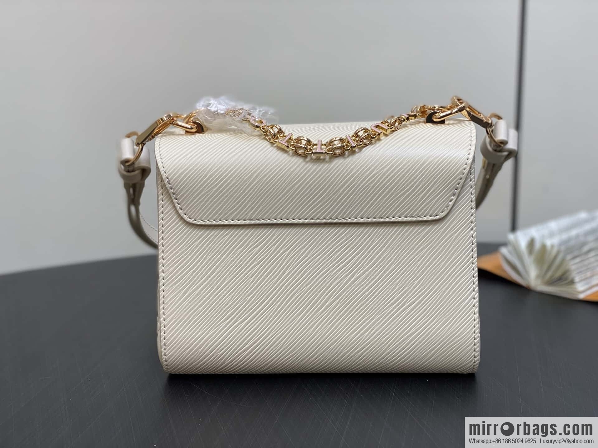 [Boutique‑grade] M50332 meters white letters, water ripple Twist chain bag Twist PM handbag