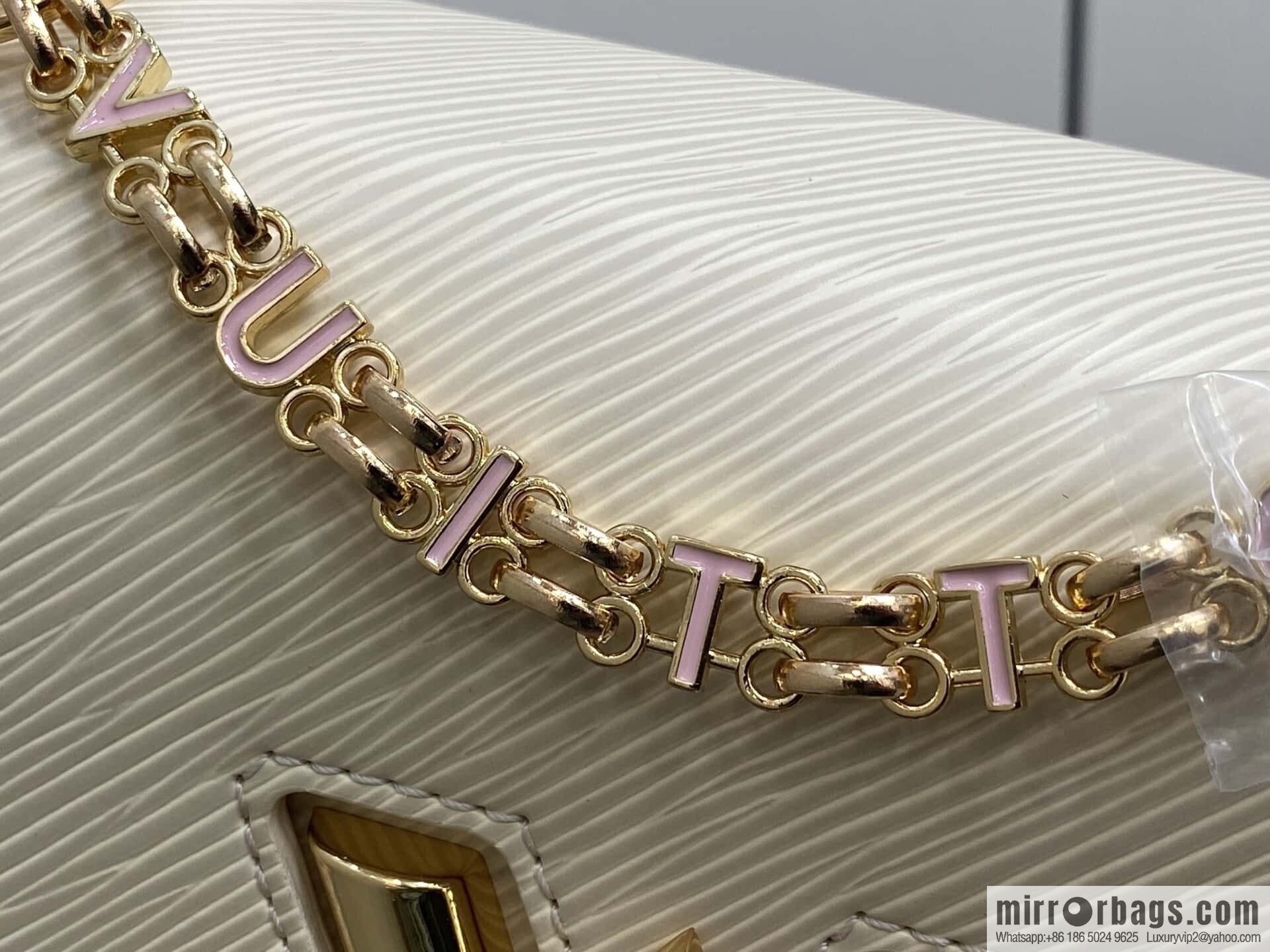 [Boutique‑grade] M50332 meters white letters, water ripple Twist chain bag Twist PM handbag