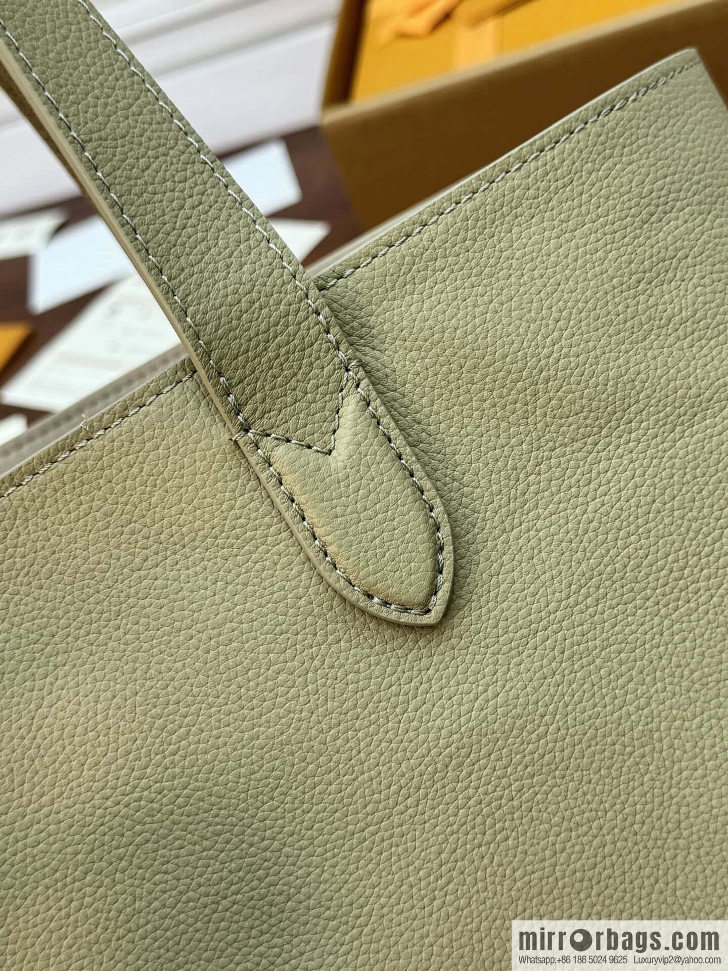 LV M25343 Low Key Cabas MM