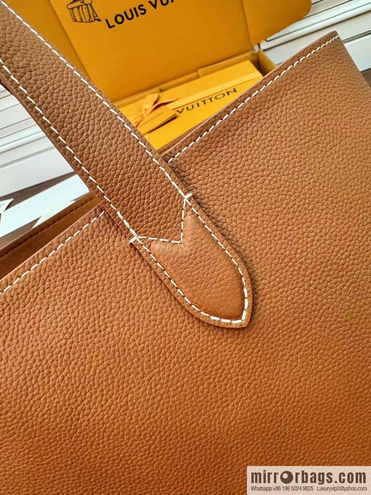 LV M25342 Low Key Cabas MM