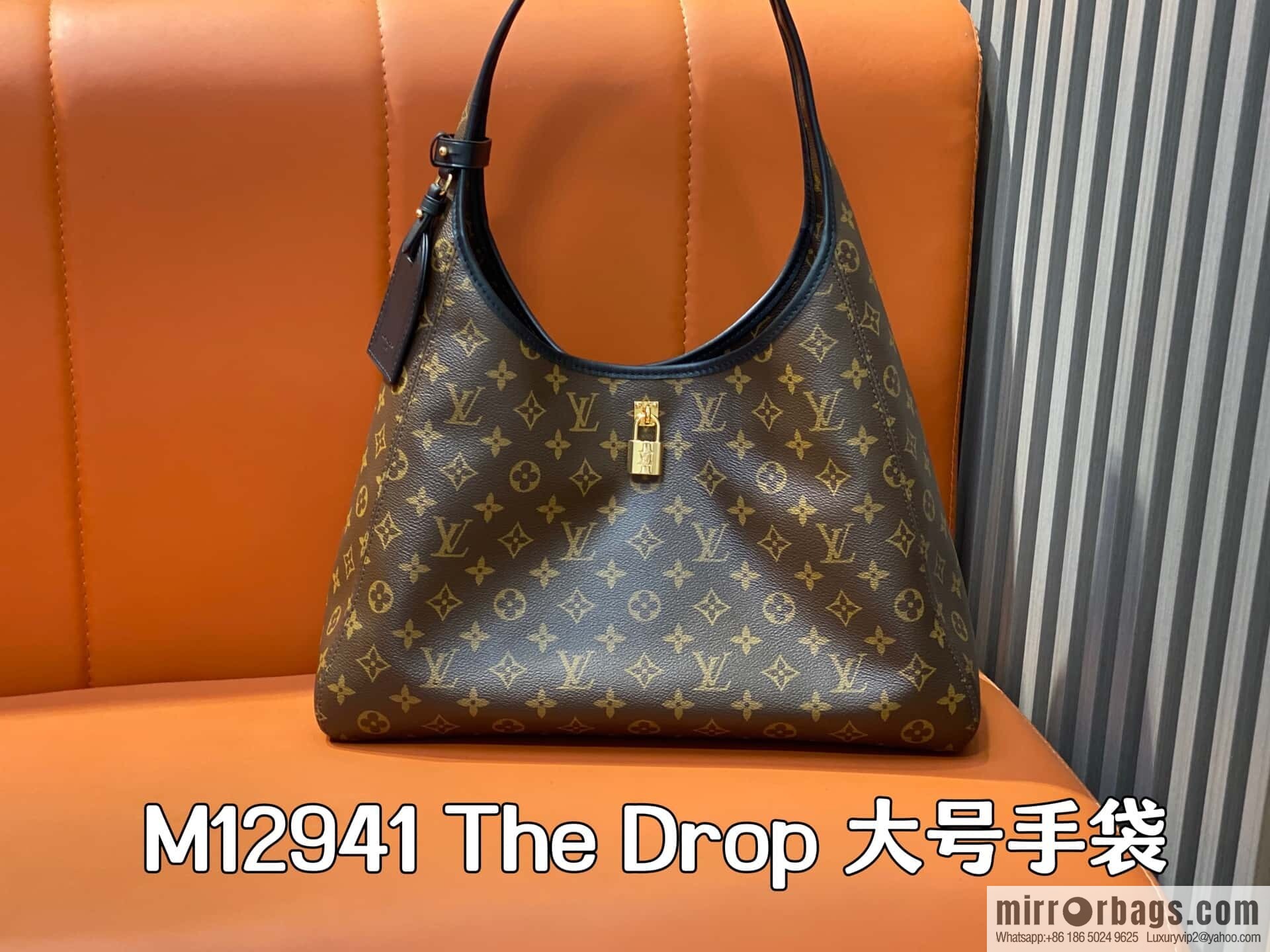 [Premium‑quality] M12941 monogram black hand carry armpit bag The Drop large handbag