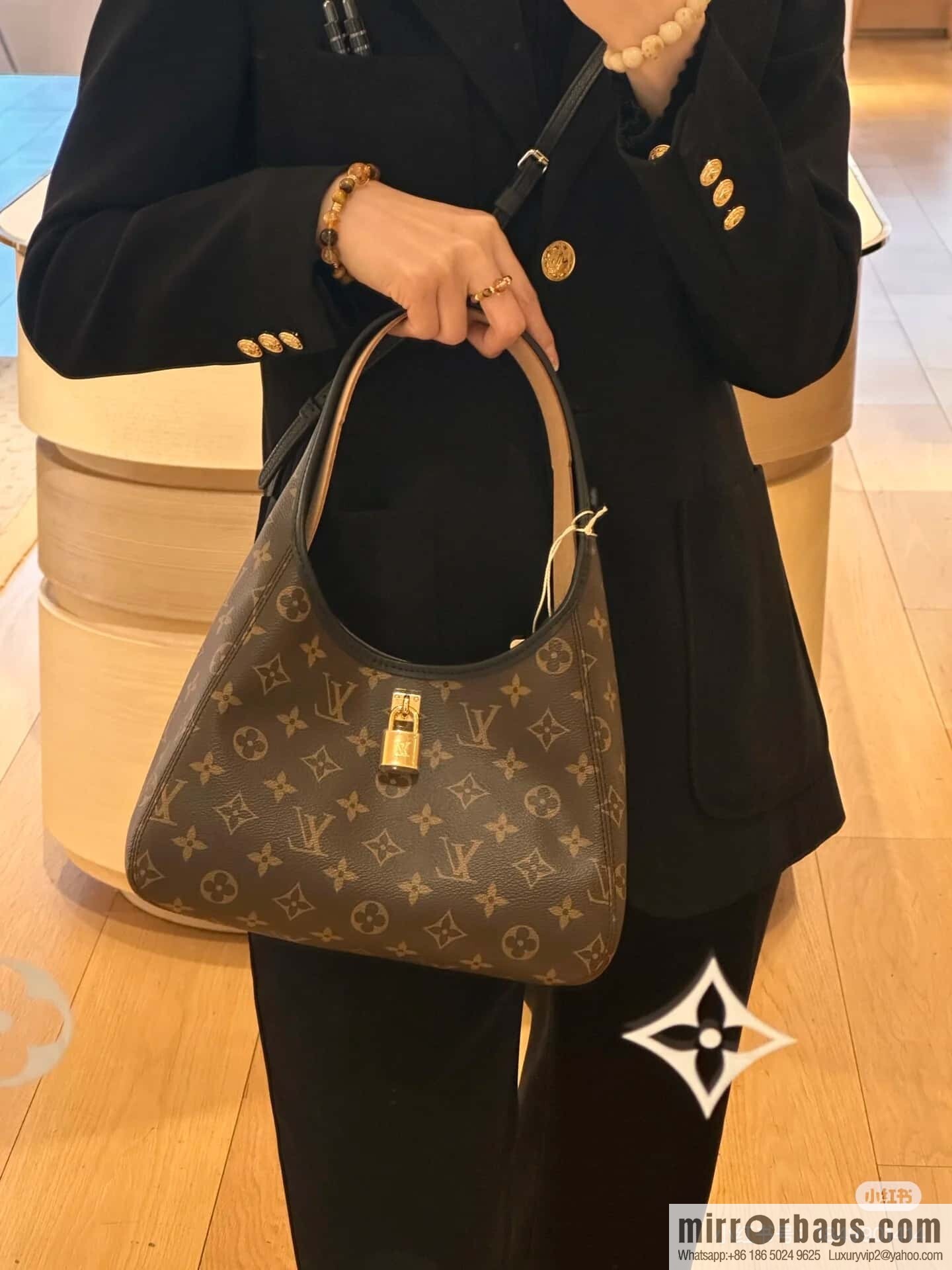 [Premium‑quality] M12940 monogram black hand carry armpit bag, the new The Drop small handbag of the season