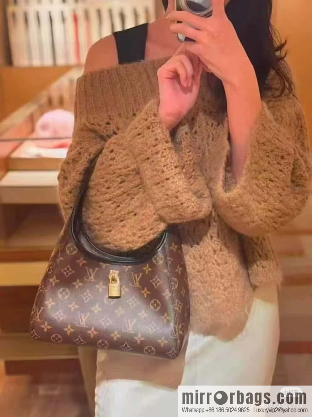[Premium‑quality] M12940 monogram black hand carry armpit bag, the new The Drop small handbag of the season