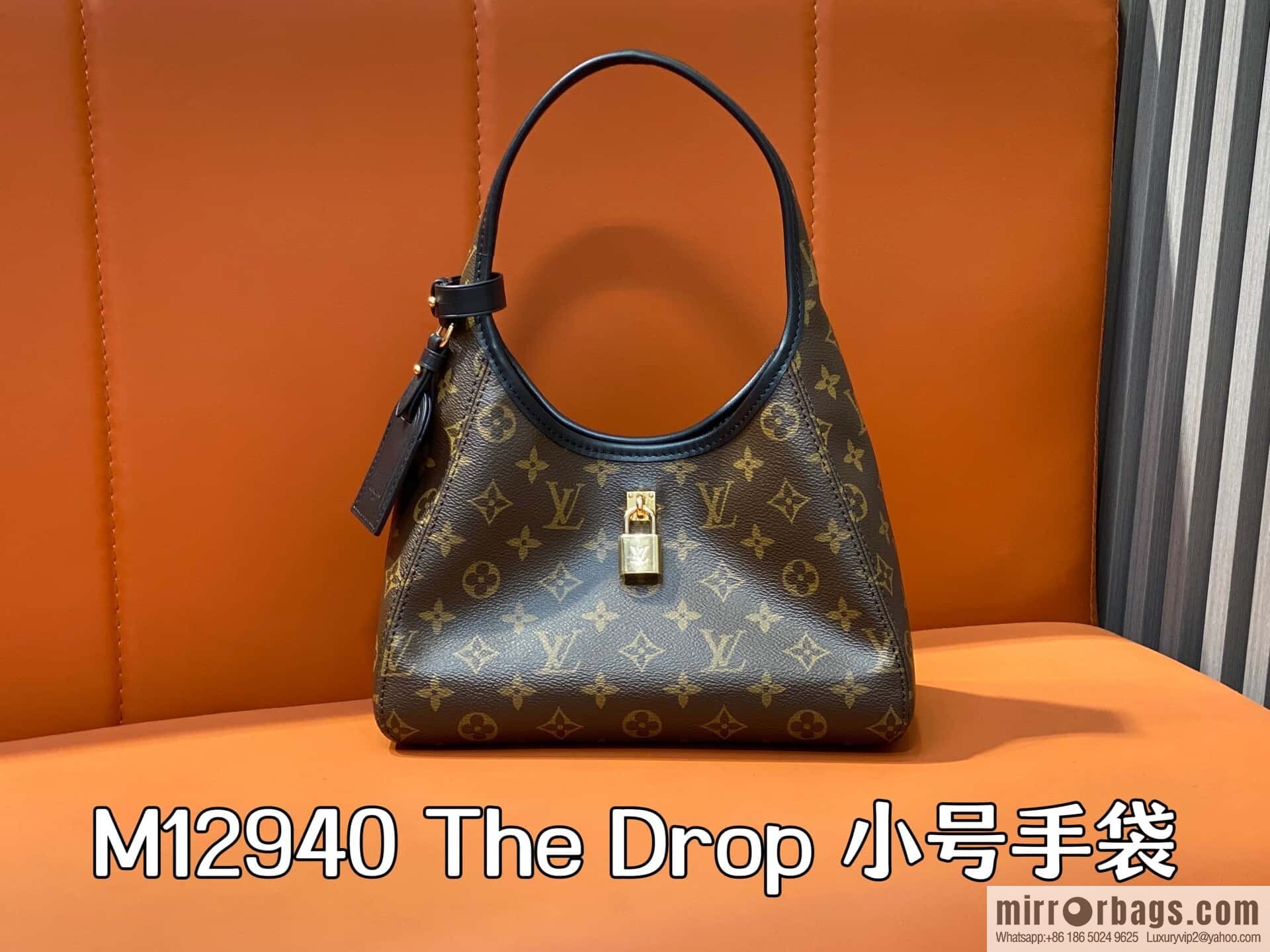 [Premium‑quality] M12940 monogram black hand carry armpit bag, the new The Drop small handbag of the season