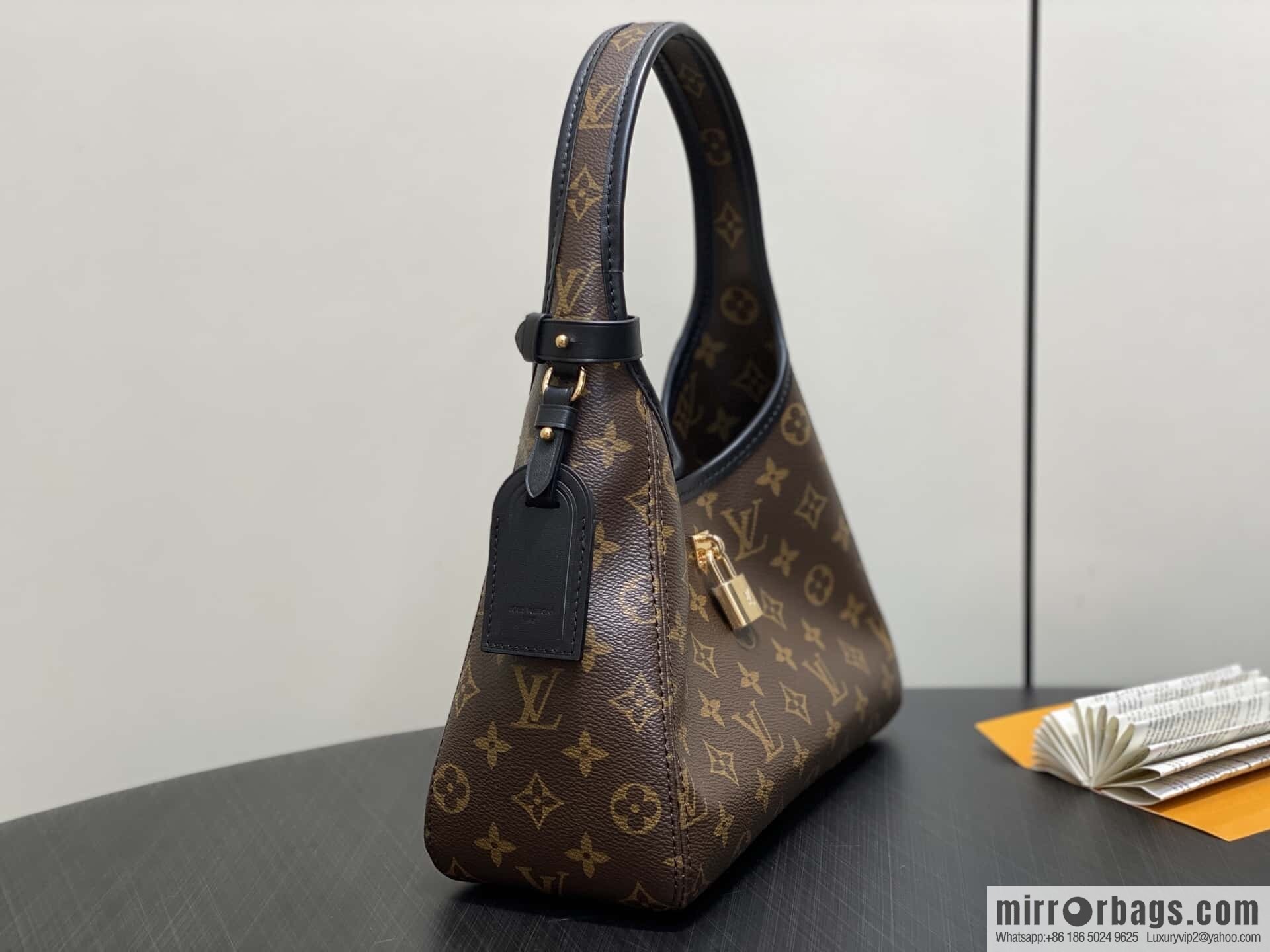 [Premium‑quality] M12940 monogram black hand carry armpit bag, the new The Drop small handbag of the season