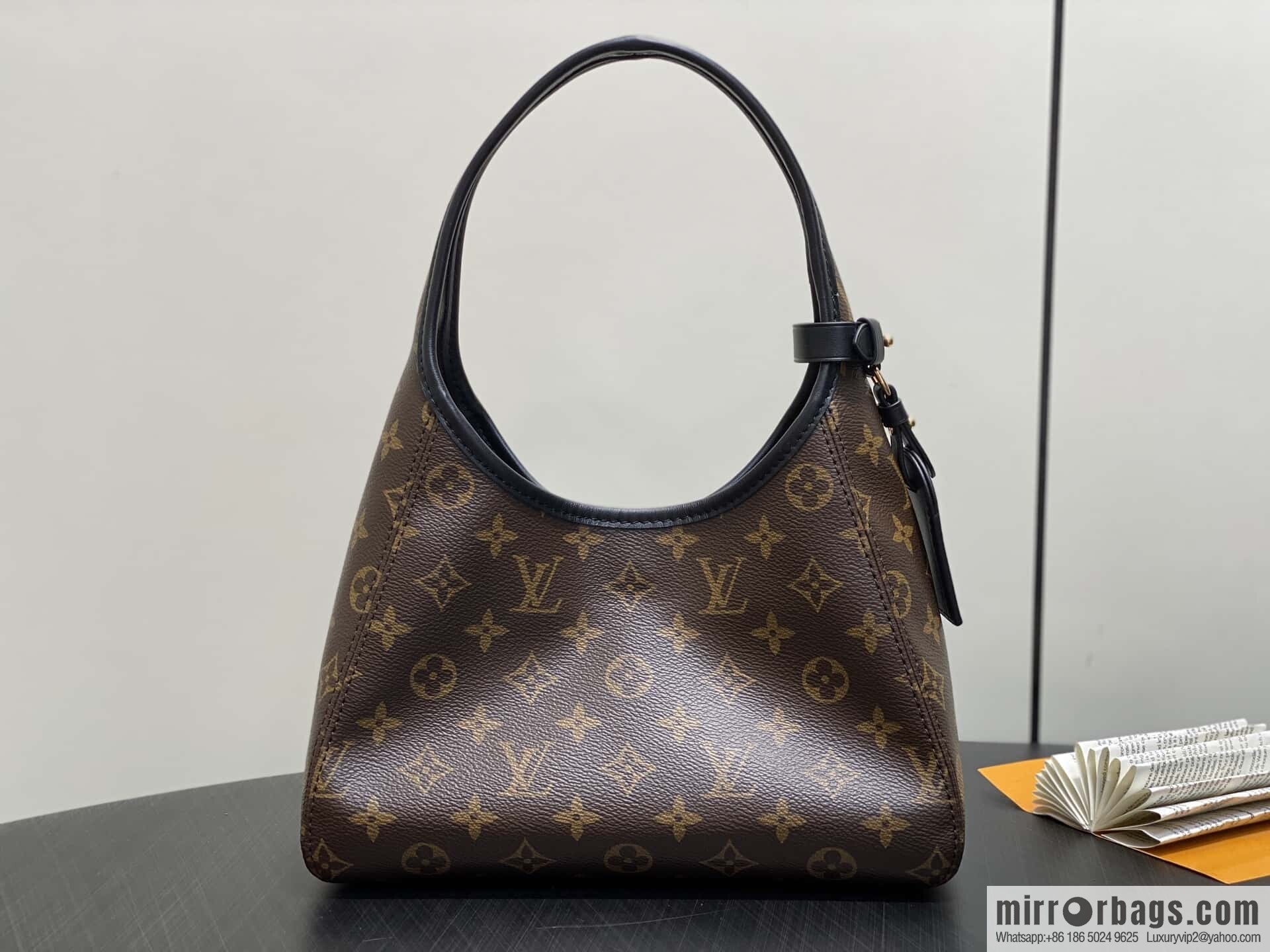 [Premium‑quality] M12940 monogram black hand carry armpit bag, the new The Drop small handbag of the season