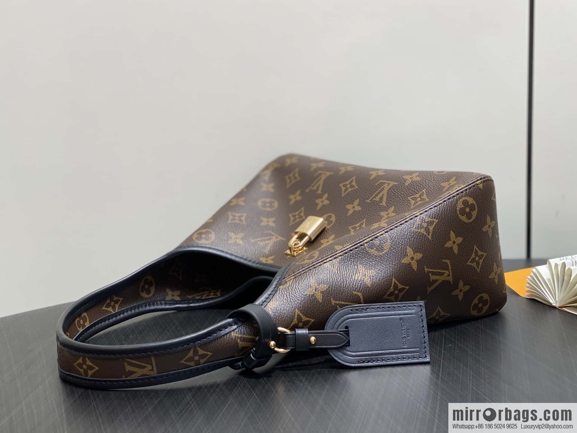 [Premium‑quality] M12940 monogram black hand carry armpit bag, the new The Drop small handbag of the season