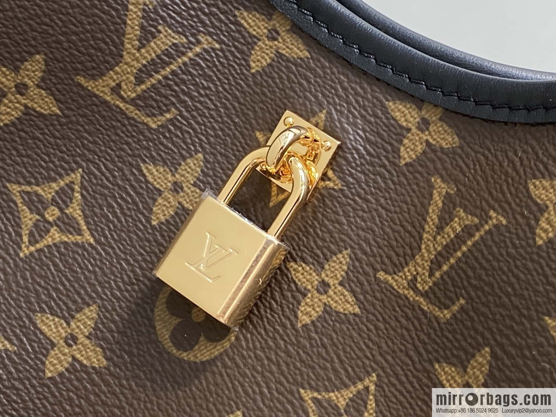 [Premium‑quality] M12940 monogram black hand carry armpit bag, the new The Drop small handbag of the season