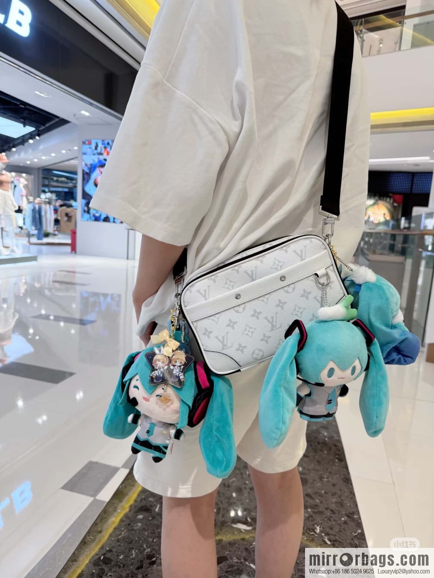 [Boutique‑grade] M31069 white flower, men's bag messenger bag ALPHA messenger bag