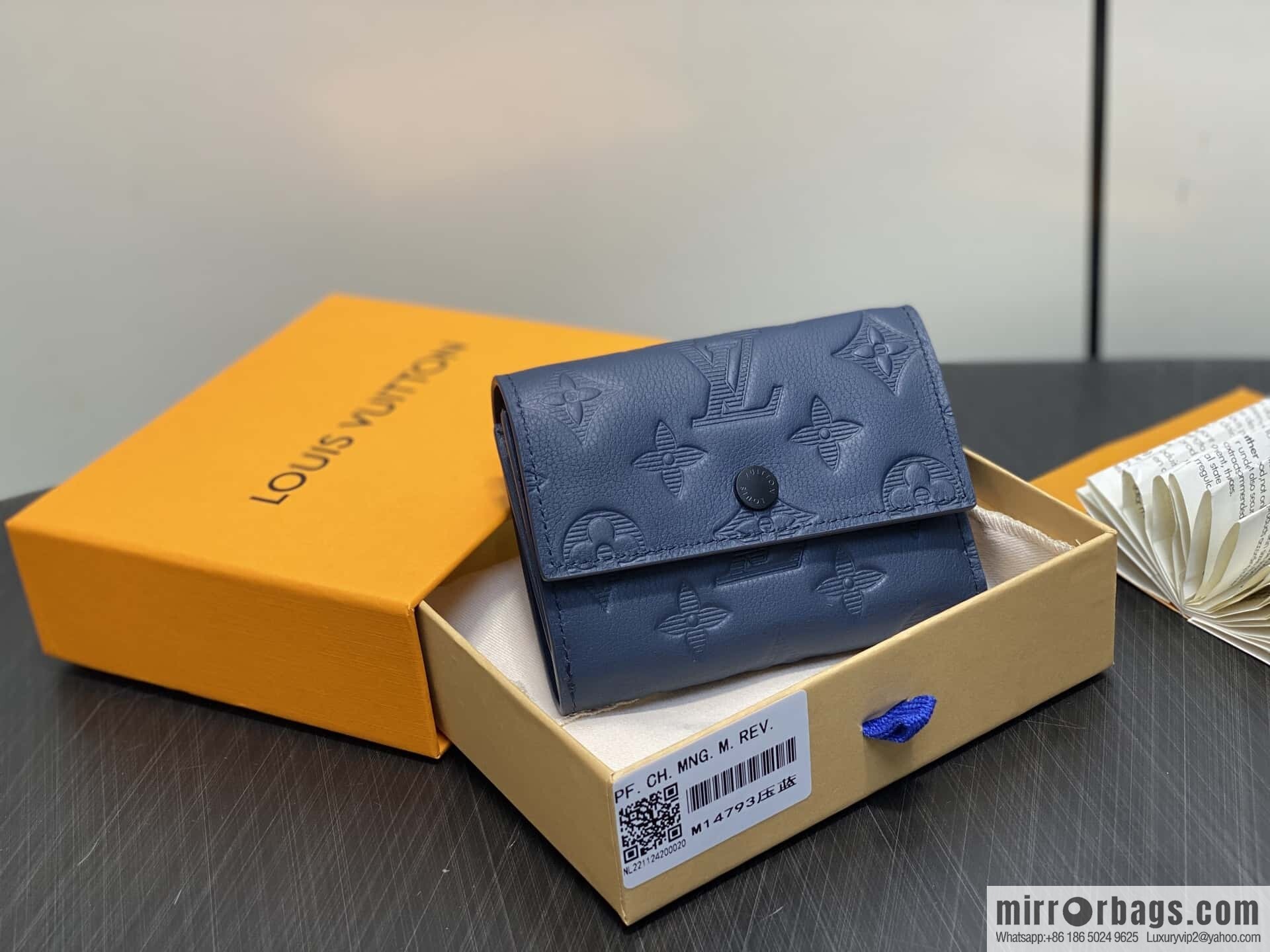 [Premium‑quality] M14793 dark blue, full leather embossed M12598 tri-fold wallet Victor wallet