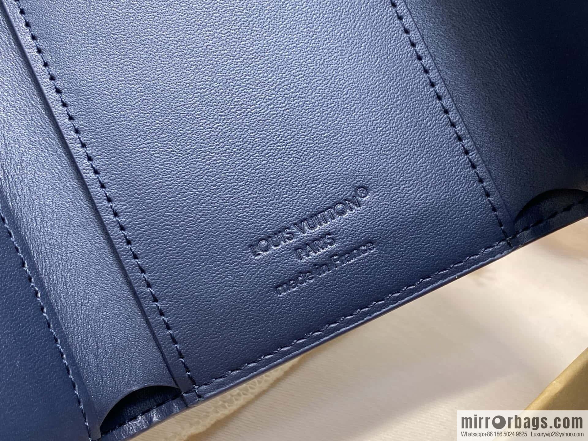 [Premium‑quality] M14793 dark blue, full leather embossed M12598 tri-fold wallet Victor wallet