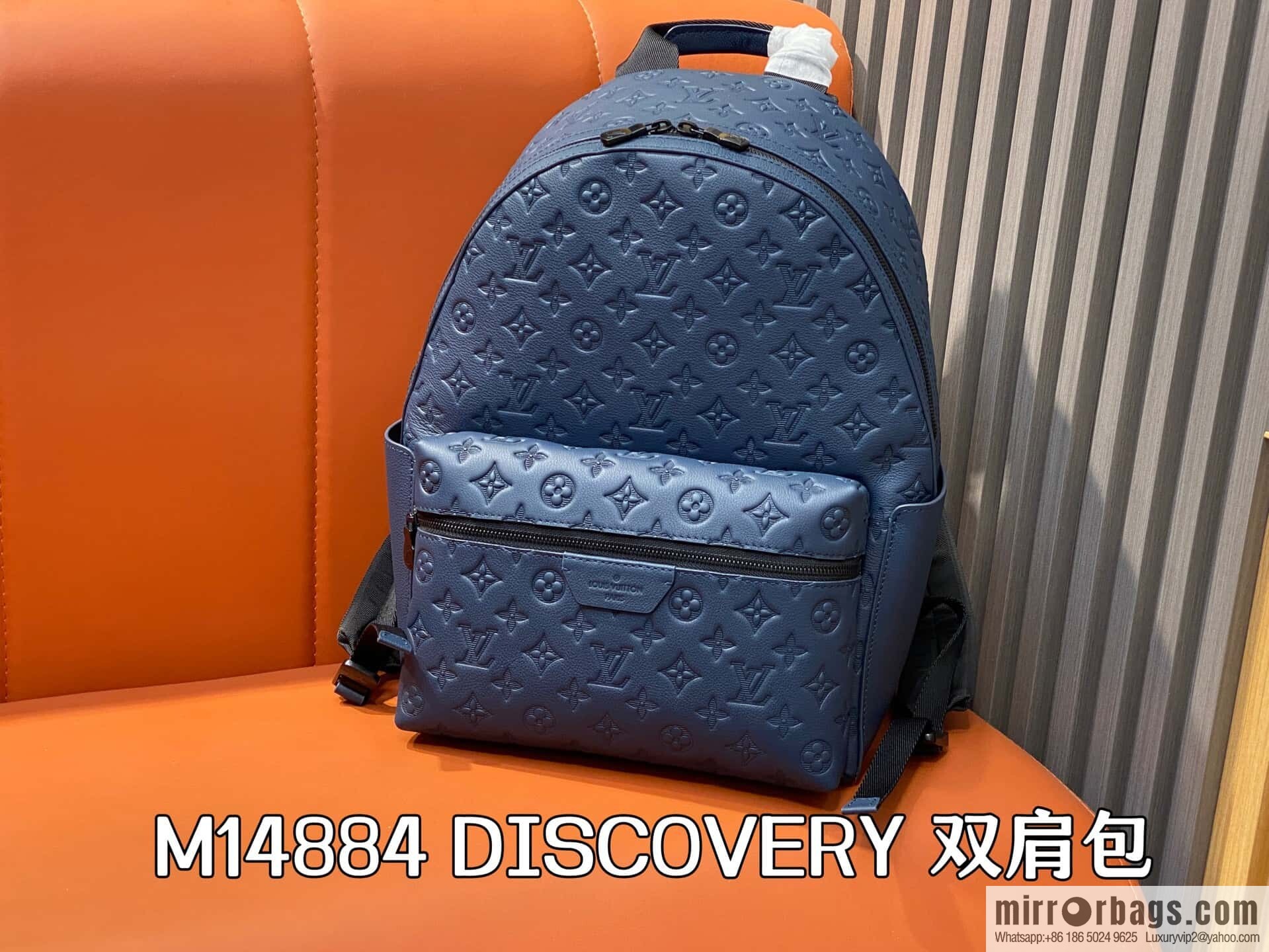 [Premium‑quality] M14884 dark blue, opposite version shoulder strap full leather embossed backpack DISCOVERY backpack