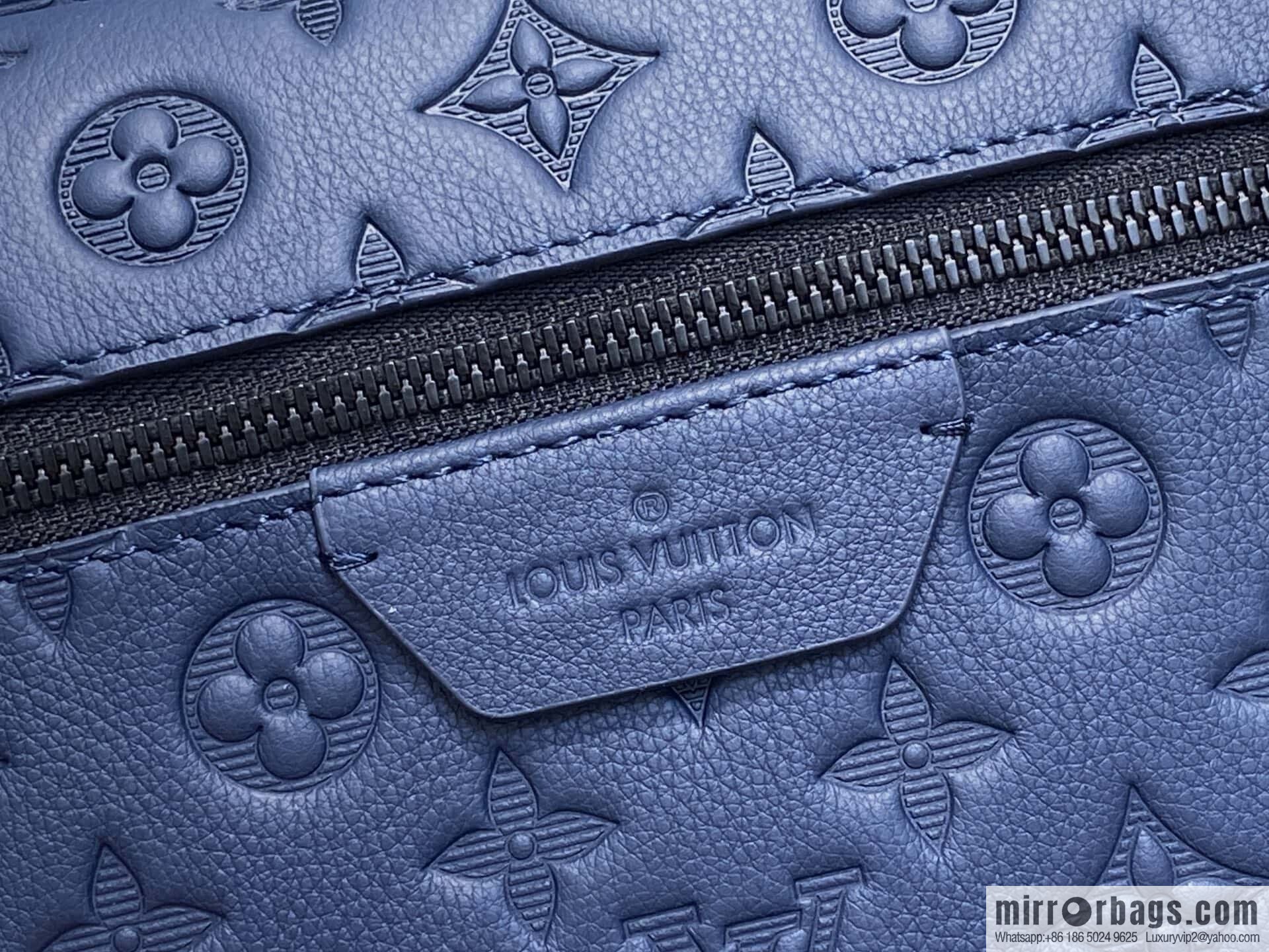 [Premium‑quality] M14884 dark blue, opposite version shoulder strap full leather embossed backpack DISCOVERY backpack