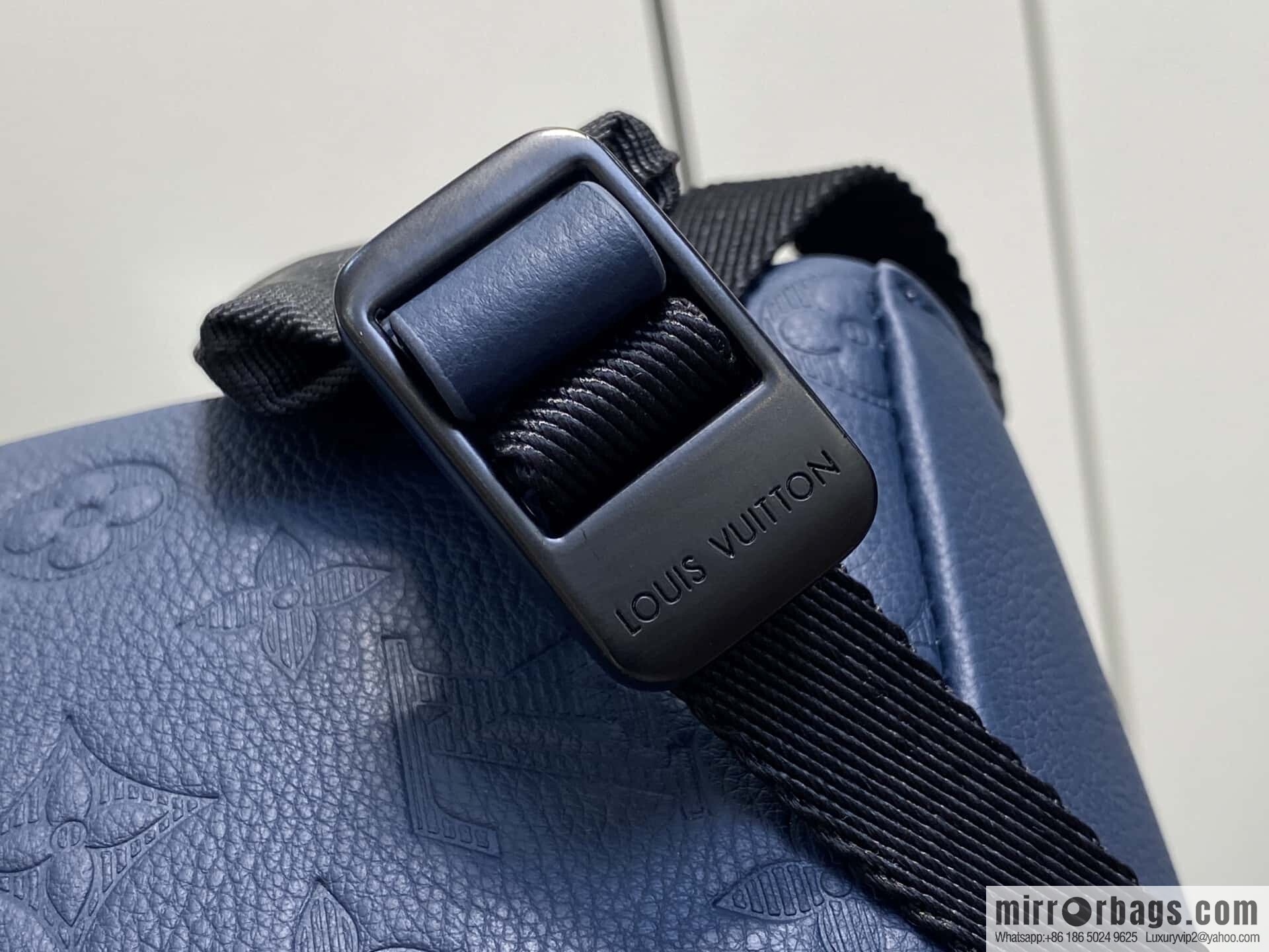 [Premium‑quality] M14884 dark blue, opposite version shoulder strap full leather embossed backpack DISCOVERY backpack