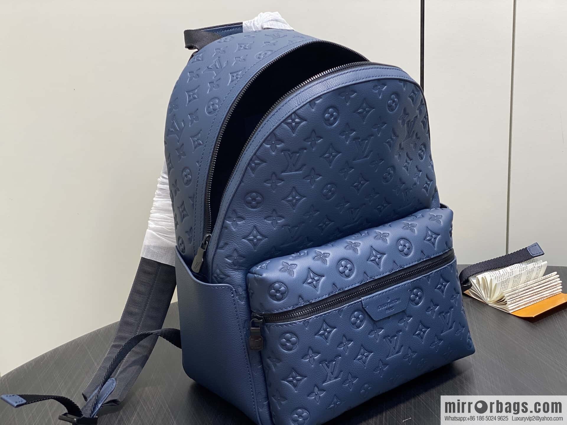 [Premium‑quality] M14884 dark blue, opposite version shoulder strap full leather embossed backpack DISCOVERY backpack
