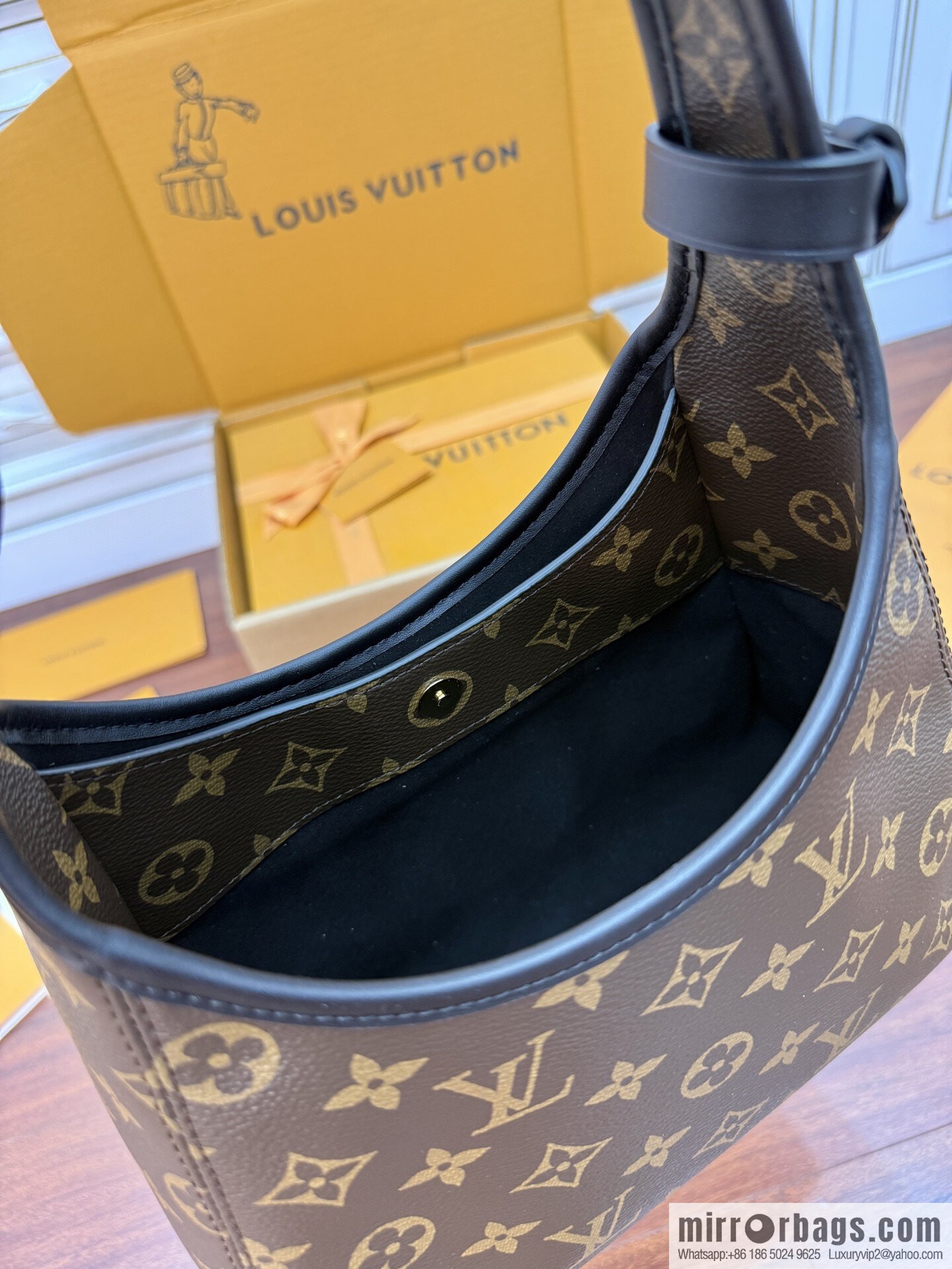 LV M12940 NEW The Drop PM