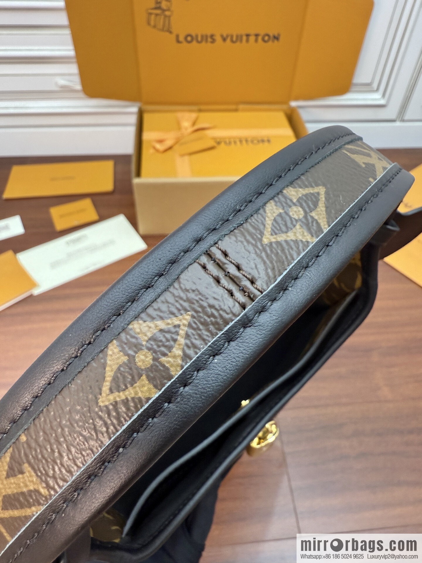 LV M12940 NEW The Drop PM