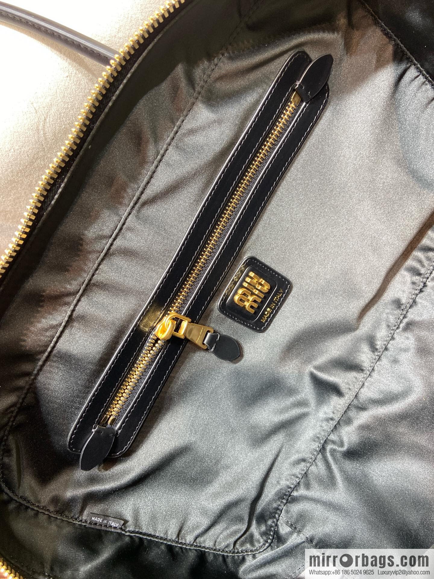 𝐌𝐈𝐔𝐌𝐈𝐔 new upgraded long handle briefcase ✨ 5BB117 black