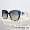 PRADA temple triangle embellished sunglasses