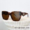PRADA temple triangle embellished sunglasses