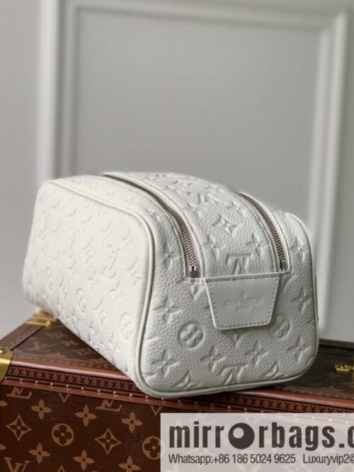 M82576 Gray and white, this Dopp Kit toilet bag.