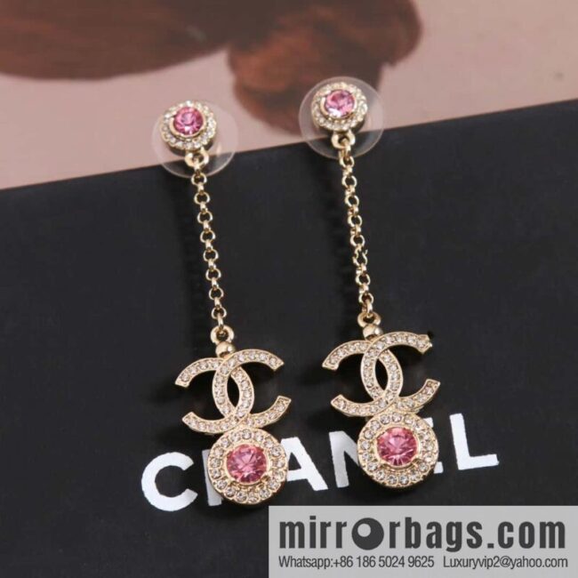 New, Chanel C2 double c round pink diamond stud earrings.