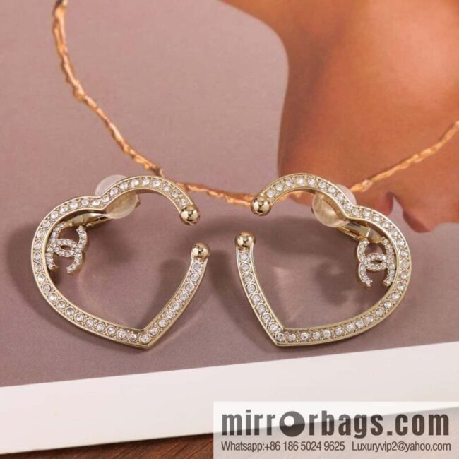 New, Chanel C1 full diamond peach heart love earclip earrings.