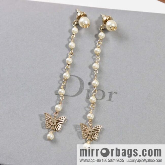 New ☑️ Dior tassel gold butterfly pearl CD stud earrings