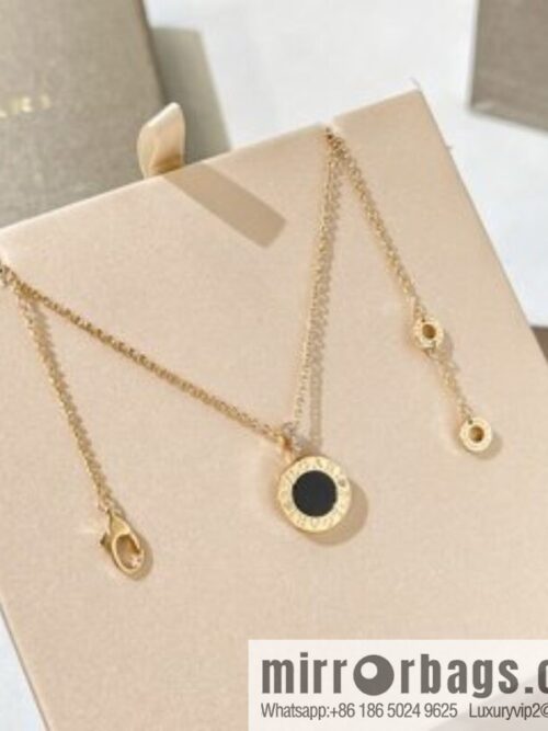 i1632844000_1679_2-800x800irwi1vu0gqg15714_20250716011624.jpg BVLGARI Bulgari ring black and white double-sided necklace