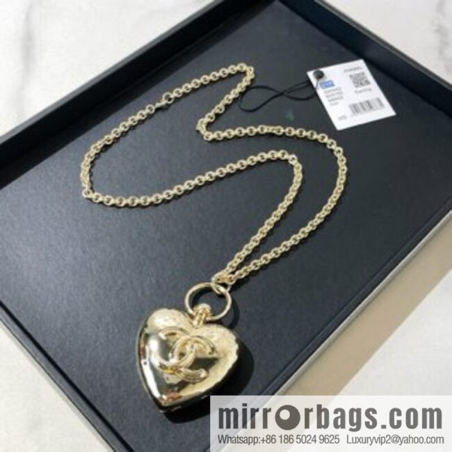 Chanel double c gold peach heart sweater chain necklace