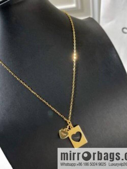 Celine cut-out peach heart necklace