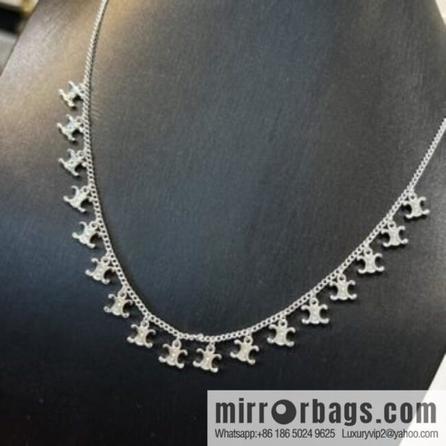 Celine Arc de Triomphe fringed necklace earrings