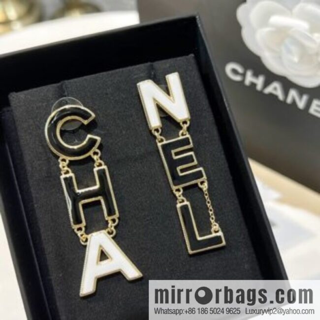 New ☑️ Chanel asymmetrical letter stud earrings