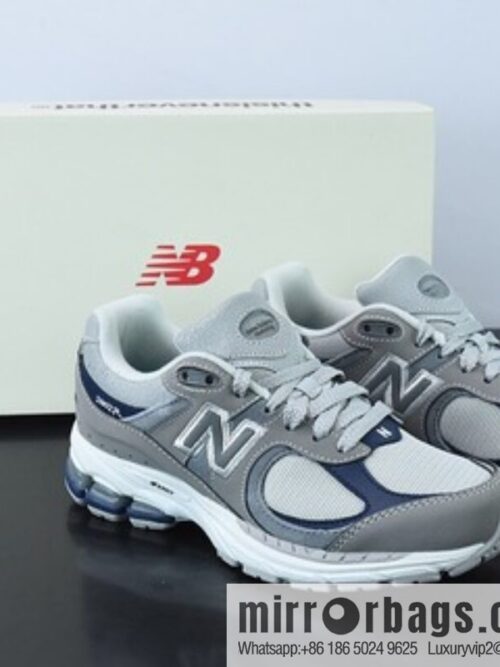 o_1gfd9ntlm1gss16qdcoo1f541lrpb6-800x800yc4iylqydrx56051_20250718235506.jpg Thisisneverthat x New Balance 2002R Vintage sneakers M2002RTH