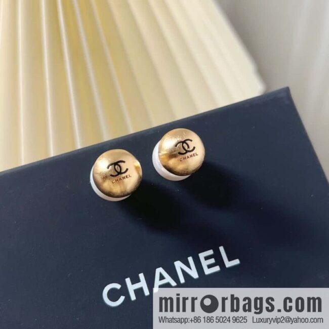 Chanel gold pearl stud earrings
