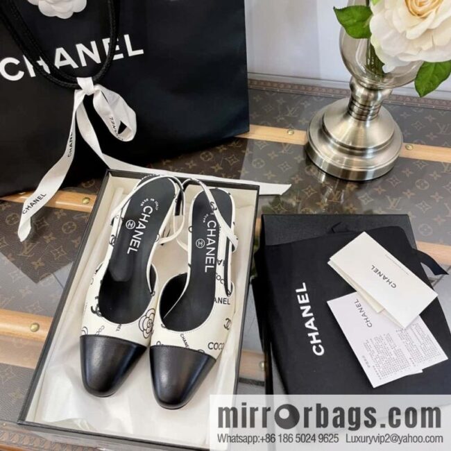 Chanel Chanel Xiaoxiang black and white color matching full logo thick heel sandals