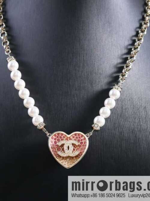 wsxc1680611504643_0-800x800ifrmldnjm1w182535_20250708195219.jpg New ☑️ Chanel double c asymmetric pearl love peach heart necklace