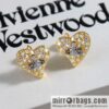 New ☑️ Vivienne Westwood Queen Mother Saturn Love Peach Heart Earrings