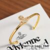 New ☑️ Vivienne Westwood Queen Mother Saturn Open Bracelet Bracelet