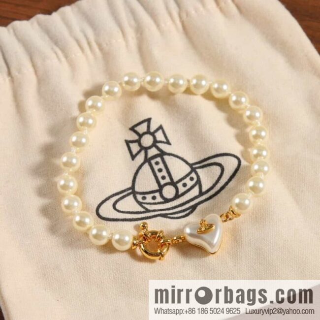 New ☑️ Vivienne Westwood Queen Mother peach heart love Saturn pearl bracelet